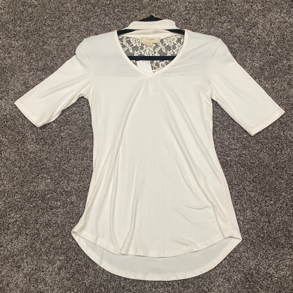 No Comment White mid sleeve lace top.